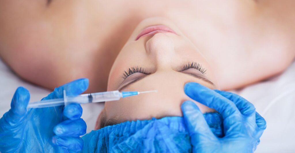 Woman getting a botox injection